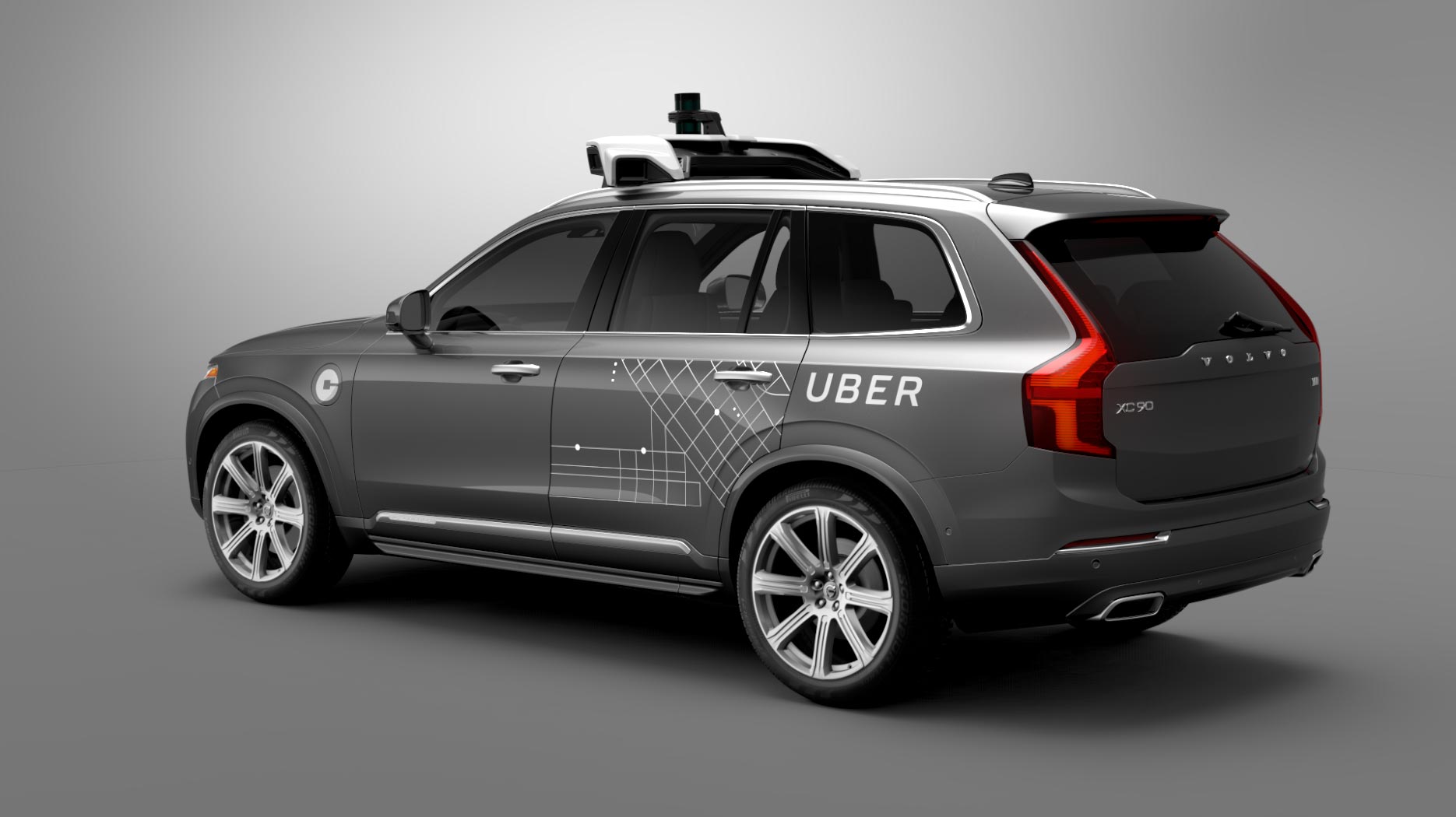 Серый Volvo XC90 с технологией самостоятельного вождения под брендом Uber.