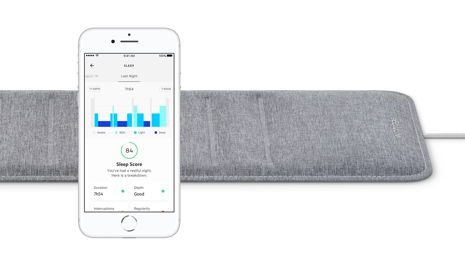 Крупный план коврика Withings Sleep Analyzer с приложением, показанным на телефоне